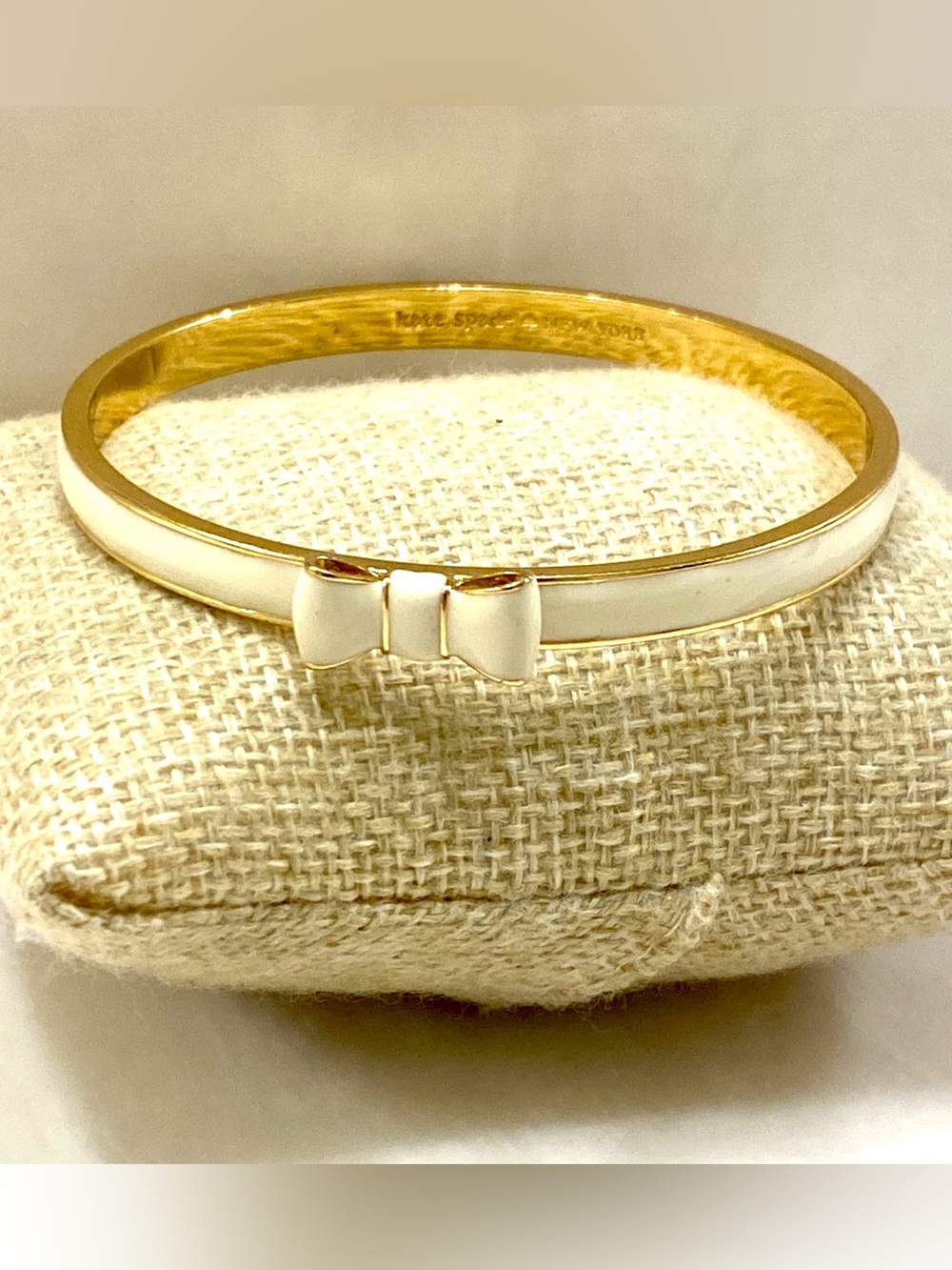 kate spade Gold and White Enamel Bow Bangle Bracelet